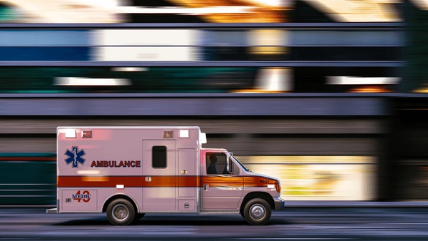 ambulance driving through city drives 600nw 1971095930